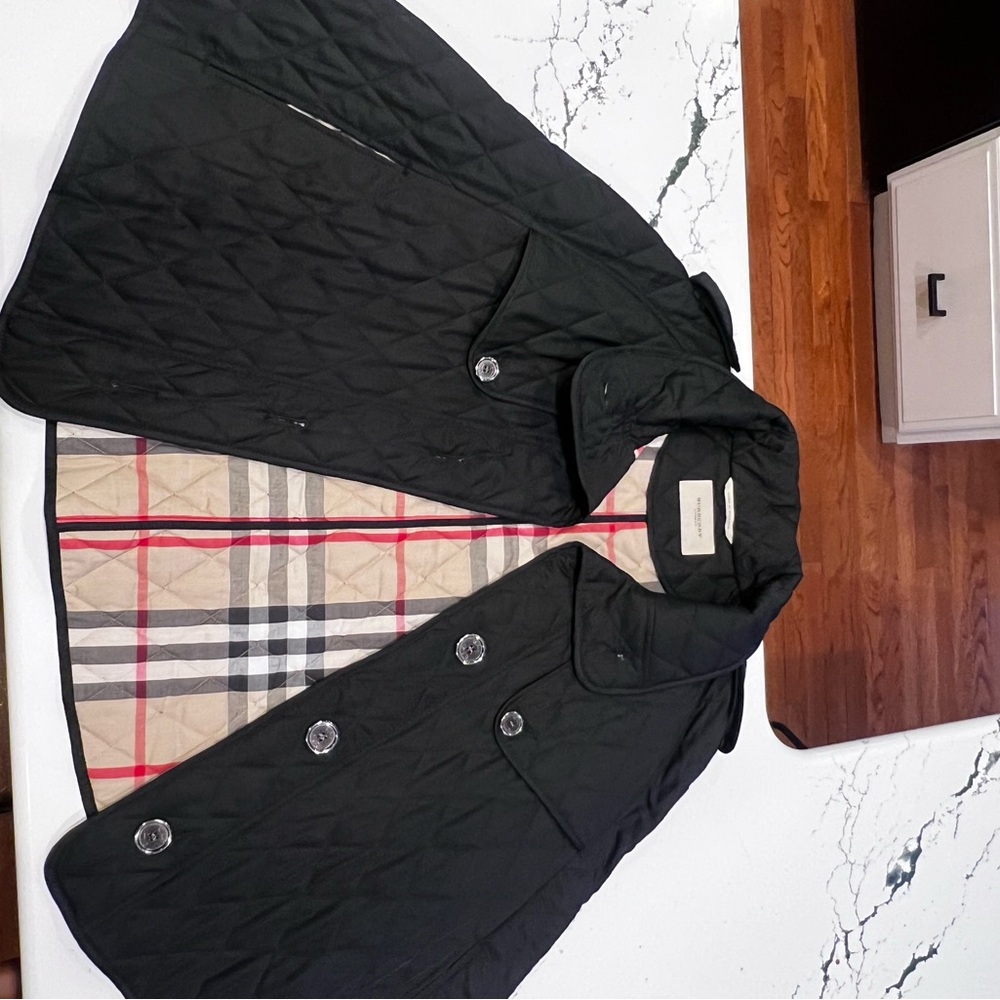 Burberry Quilted Poncho cape jacket.